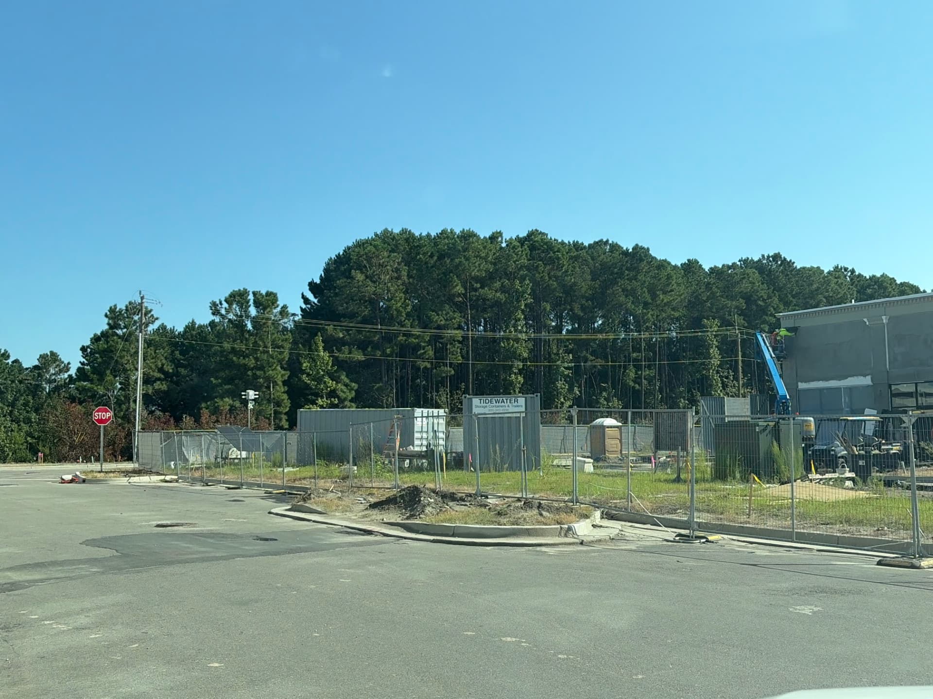 Temporary chain-link fence around a commercial construction lot